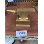 A MINITURE BRASS SAMPLE ANVIL WITH BRASS STAND