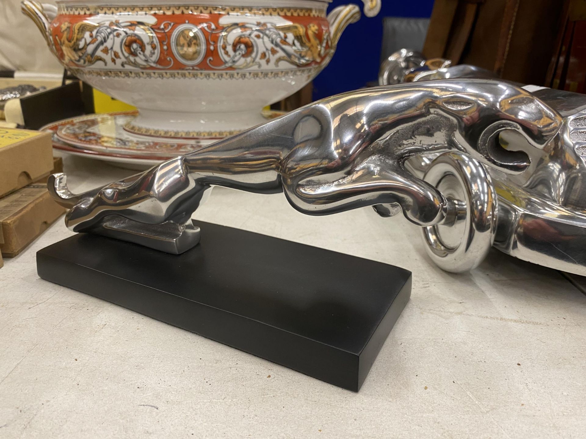 A CHROME JAGUAR CAR MASCOT ON BASE, LENGTH 31CM