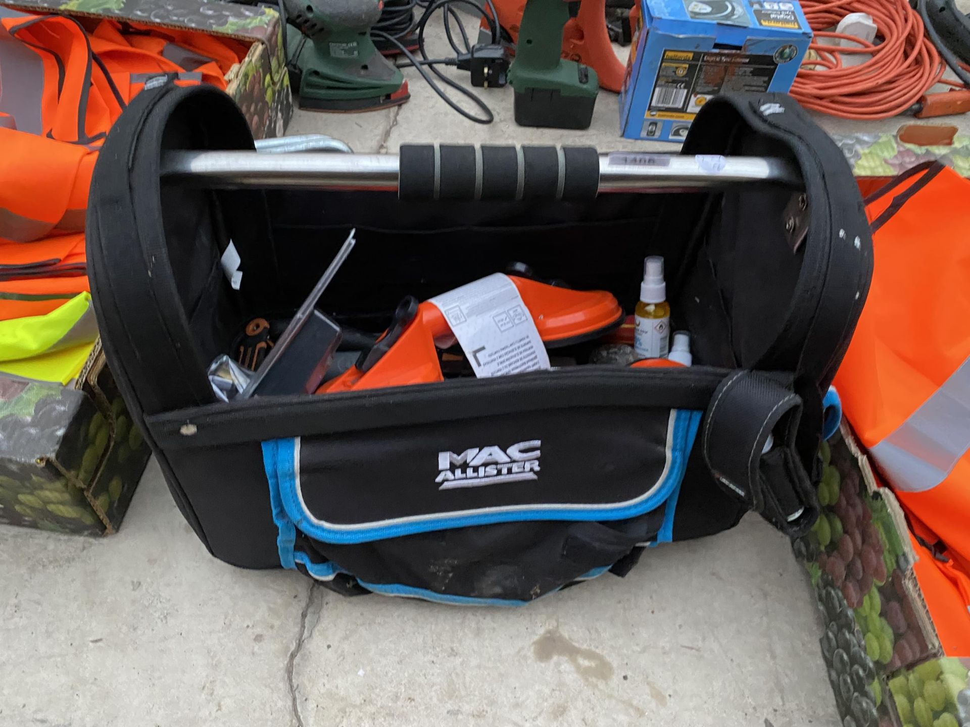 A MACALLISTER TOOL BAG AND AN ASSORTMENT OF TOOLS TO INCLUDE WINDOW GRIPPERS AND DRILL BITS ETC