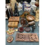 A LARGE QUANTITY OF TREEN ITEMS TO INCLUDE A SLIDING BOOKSHELF, BOXES, FIGURES, A BUST MANTLE CLOCK,