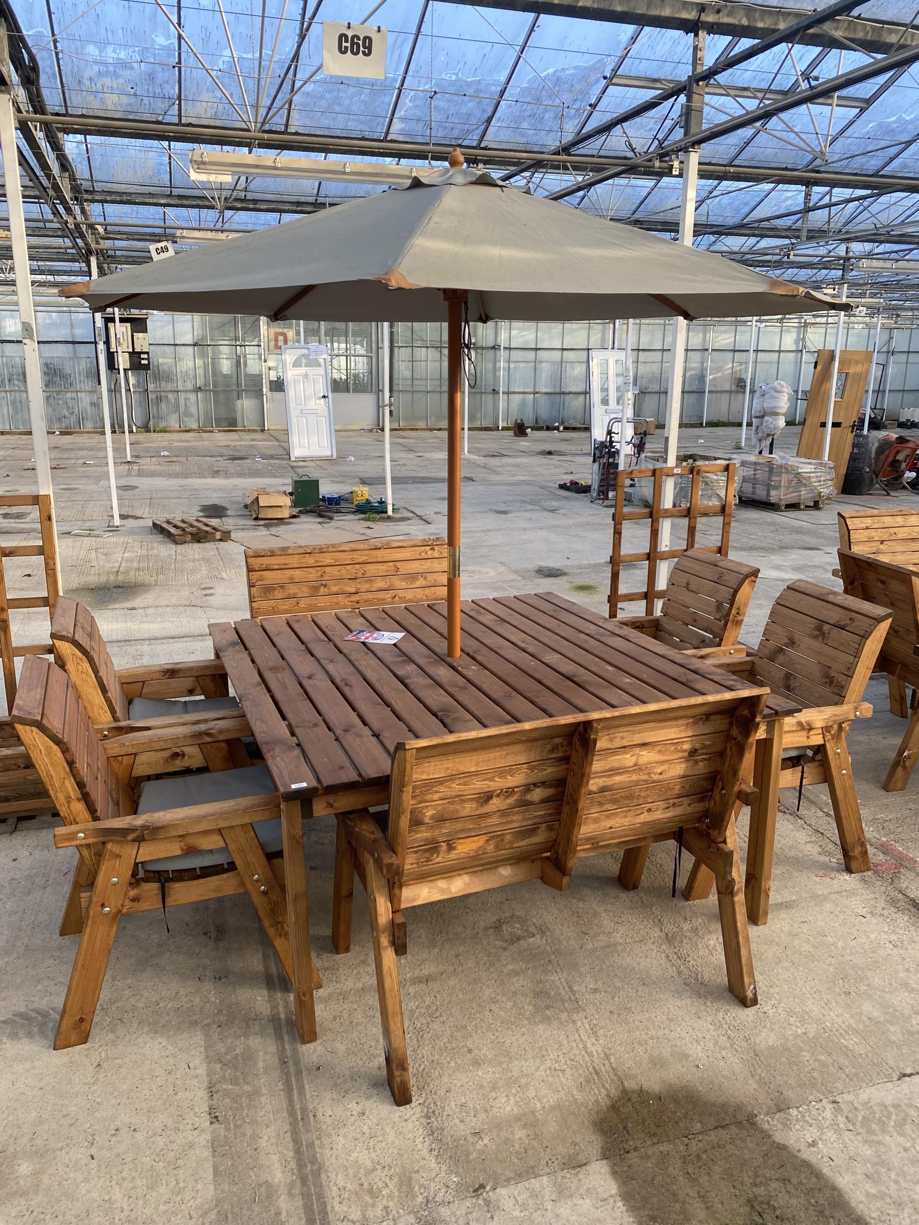 AN AS NEW EX DISPLAY CHARLES TAYLOR PATIO FURNITURE SET COMPRISING OF A LARGE SQUARE TABLE, FOUR