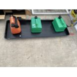 THREE PLASTIC FUEL CANS AND AN OIL TRAY
