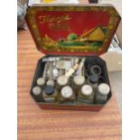 A TIN CONTAINING A VINTAGE OIL PAINT SET