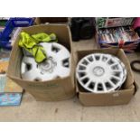 A COLLECTION OF VAUXHALL WHEEL RIMS AND TWO HI-VIZ JACKETS