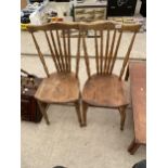 A PAIR OF ELM AND BEECH VICTORIAN KICHEN CHAIRS