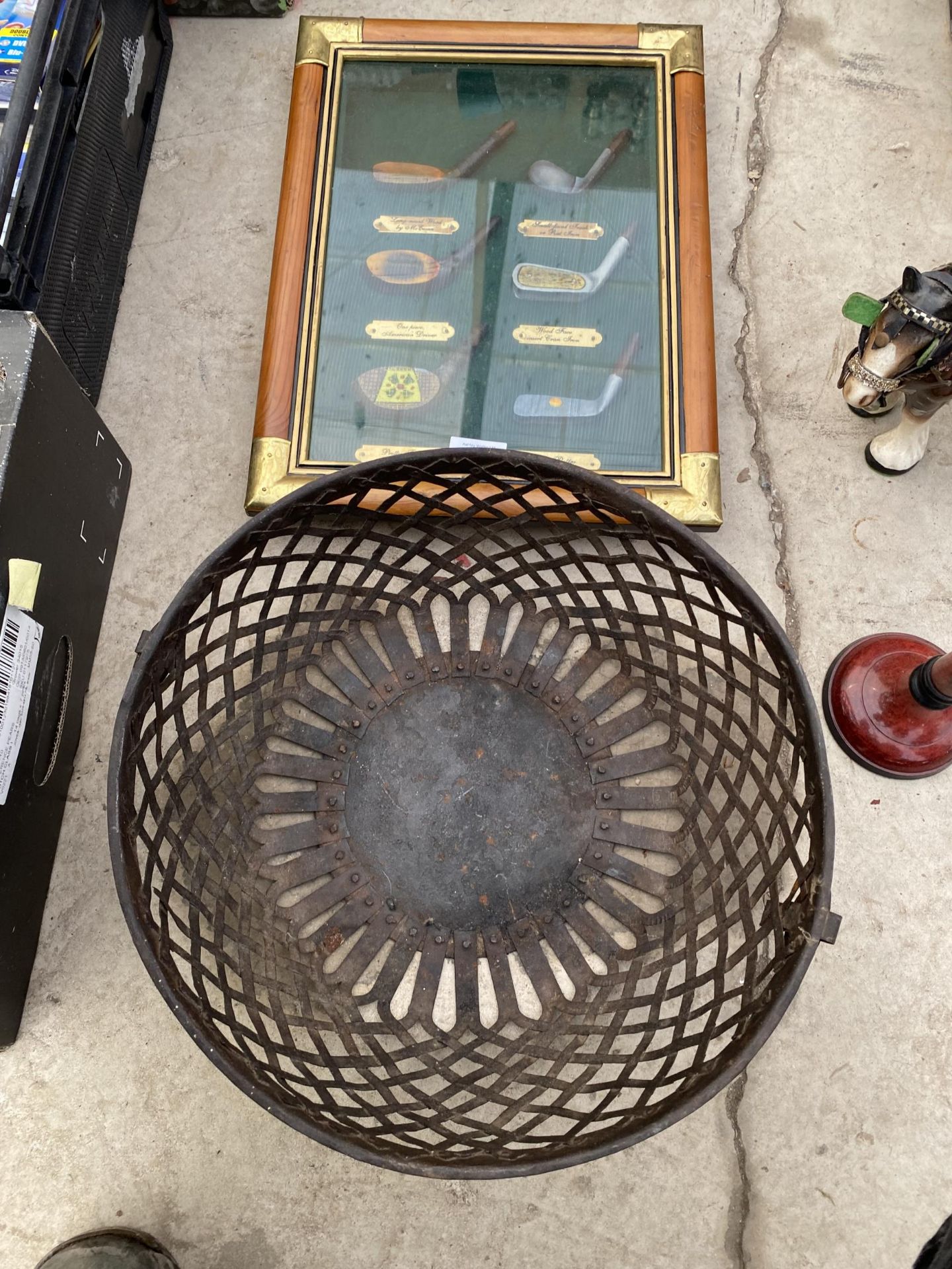 A VINTAGE METAL BASKET AND A FRAMED GOLF CLUB SET