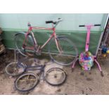 AN ASSORTMENT OF ITEMS TO INCLUDE A REVELL BIKE LACKING A SEAT, A VINTAGE CHILDS BIKE FTRAME AND A