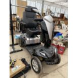 A KYMCO ELECTRIC MOBILITY SCOOTER WITH KEY AND BELIEVED IN WORKING ORDER BUT NO WARRANTY