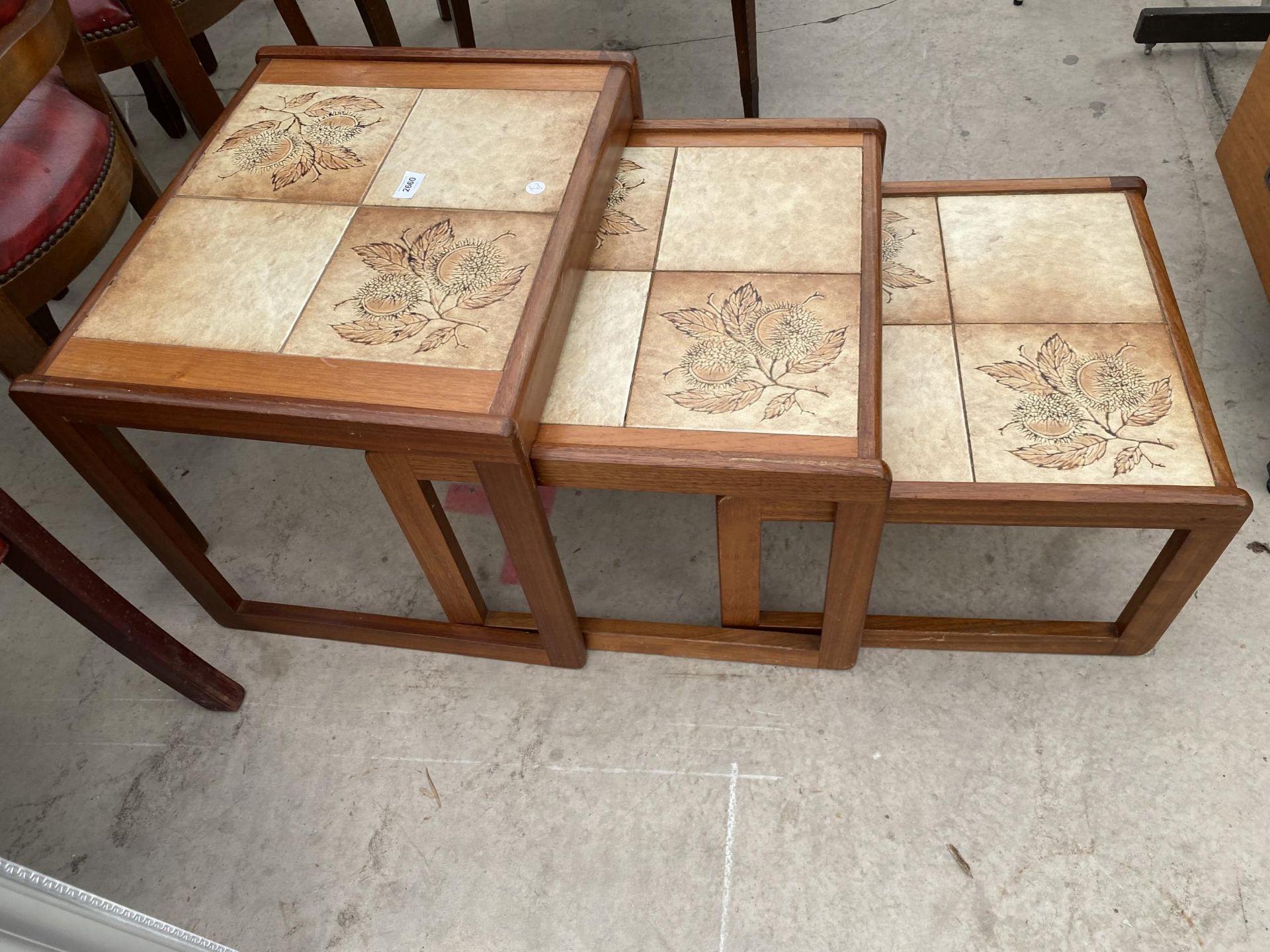 A NET OF THREE RETRO TABLES WITH INSET TILED TOPS