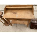 A VICTORIAN PINE WASHSTAND WITH RAISED BACK AND SINGLE DRAWER, 35" WIDE