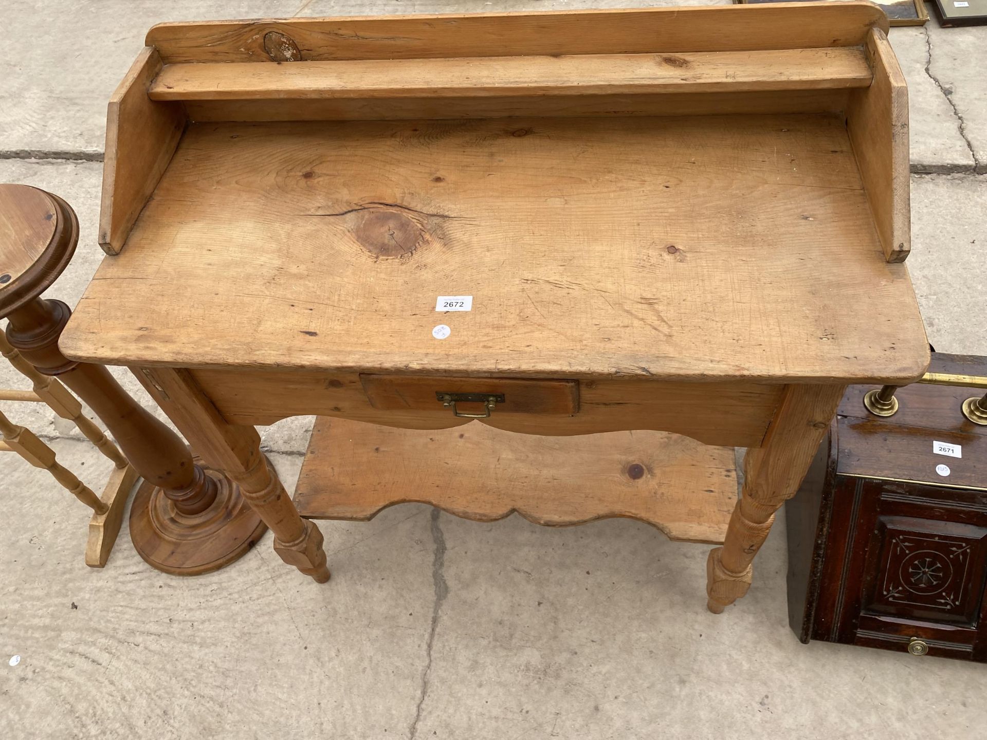 A VICTORIAN PINE WASHSTAND WITH RAISED BACK AND SINGLE DRAWER, 35" WIDE