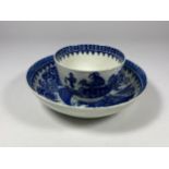 AN 18/19TH CENTURY BLUE AND WHITE WORCESTER STYLE PORCELAIN TEA BOWL & SAUCER