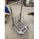 A METAL FOUR WHEELED TROLLEY