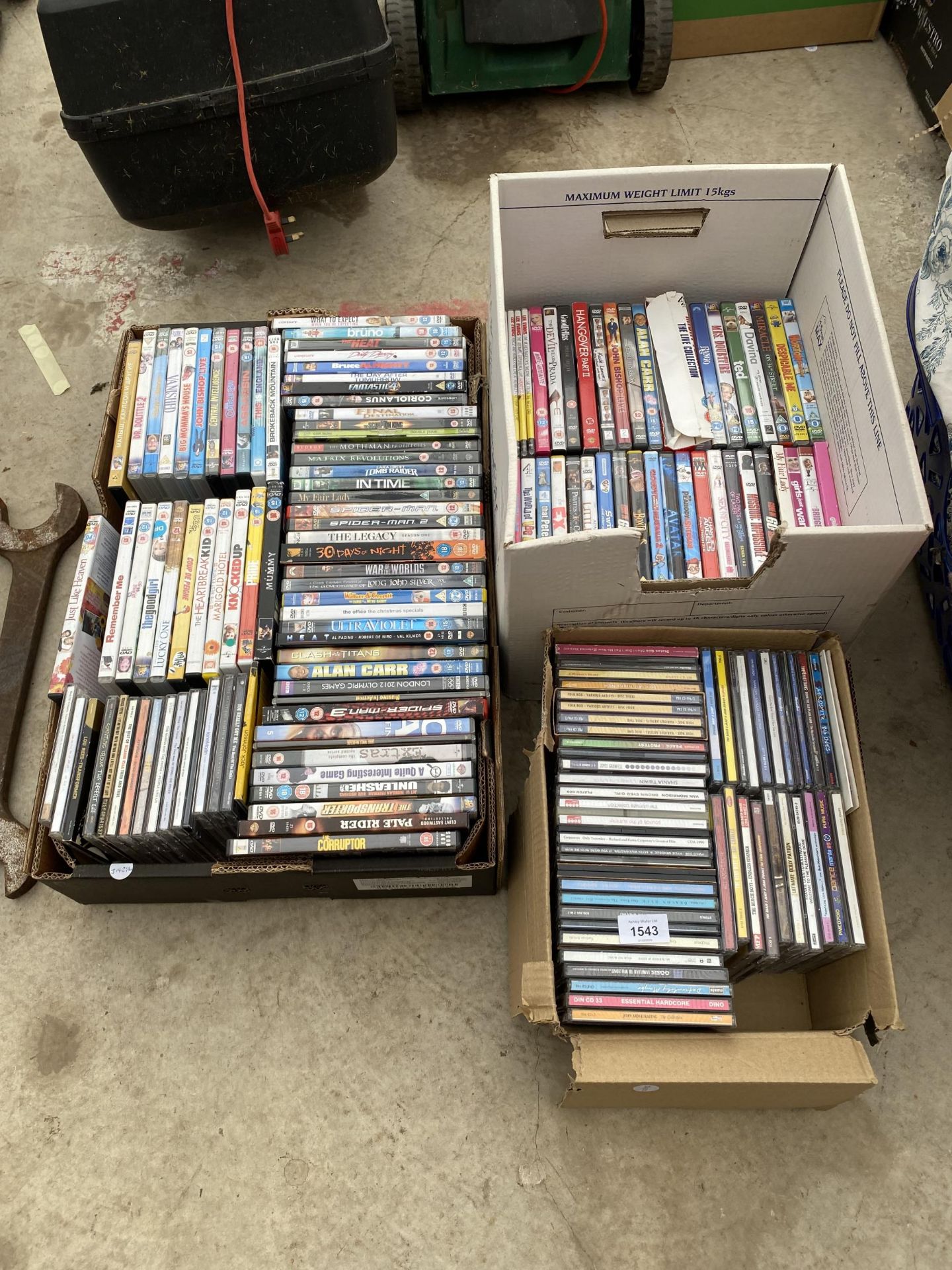A LARGE ASSORTMENT OF DVDS AND CDS ETC