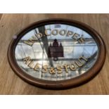 AN OAK FRAMED PUB ADVERTISING MIRROR BEARING THE NAME 'IND COOPE'S ALES & STOUT' BURTON AND ROMFORD