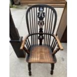A 19TH CENTURY ELM WINDSOR COMB BACK HIGH BACK CHAIR