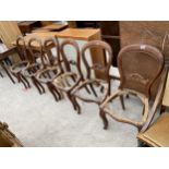 A SET OF SIX VICTORIAN MAHOGANY DINING CHAIRS, LACKING SEATS