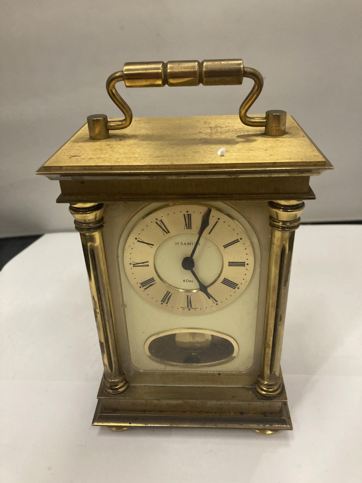 A BRASS EIGHT DAY CARRIAGE CLOCK