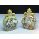 TWO CIRCULAR ORIENTAL PERFUME BOTTLES