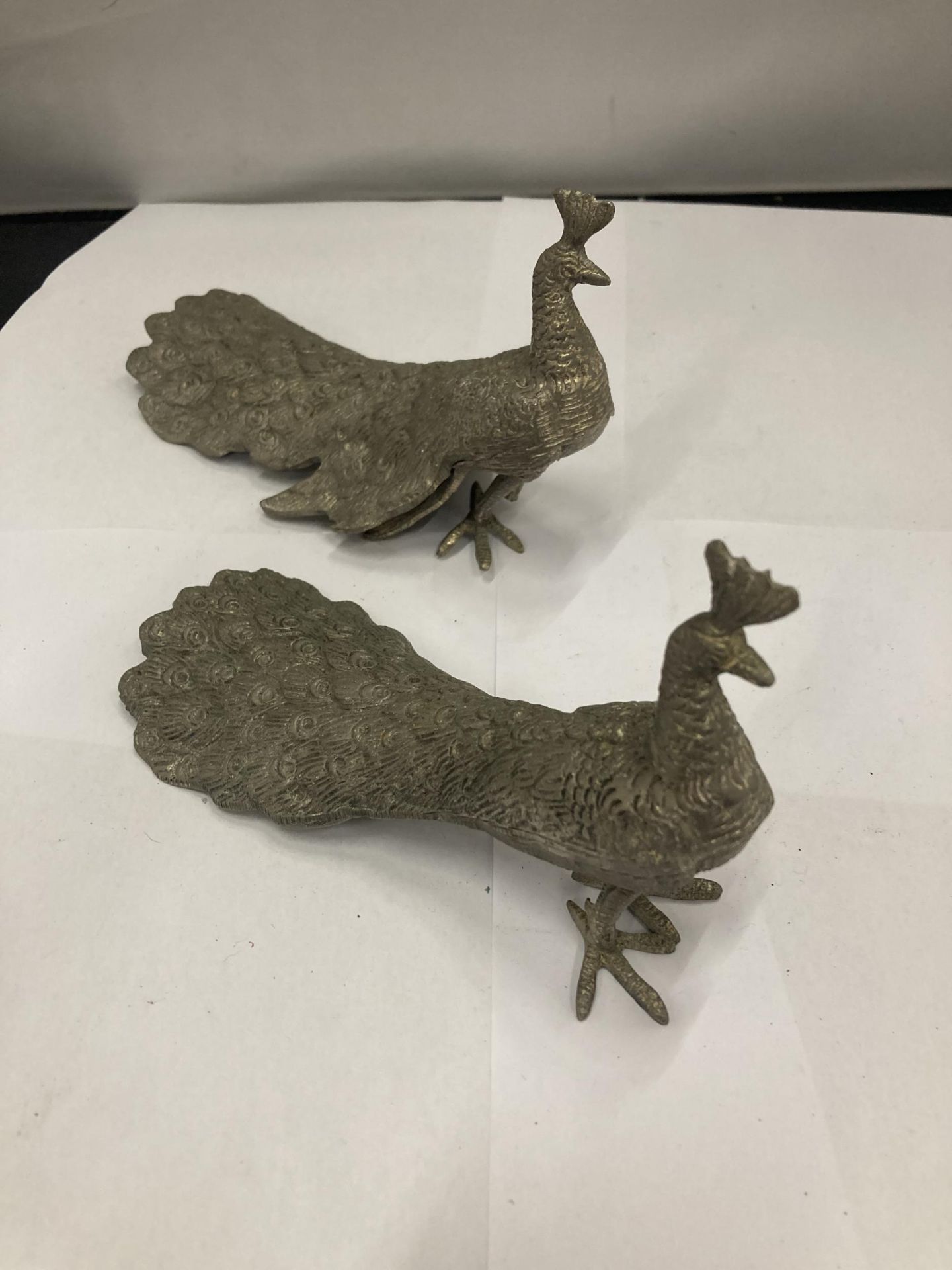 A PAIR OF WHITE METAL PEACOCKS - 1 A/F MISSING FOOT - Image 2 of 2