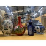 A QUANTITY OF ORIENTAL ITEMS TO INCLUDE VASES, A PLANTER, TEMPLE JARS, ETC