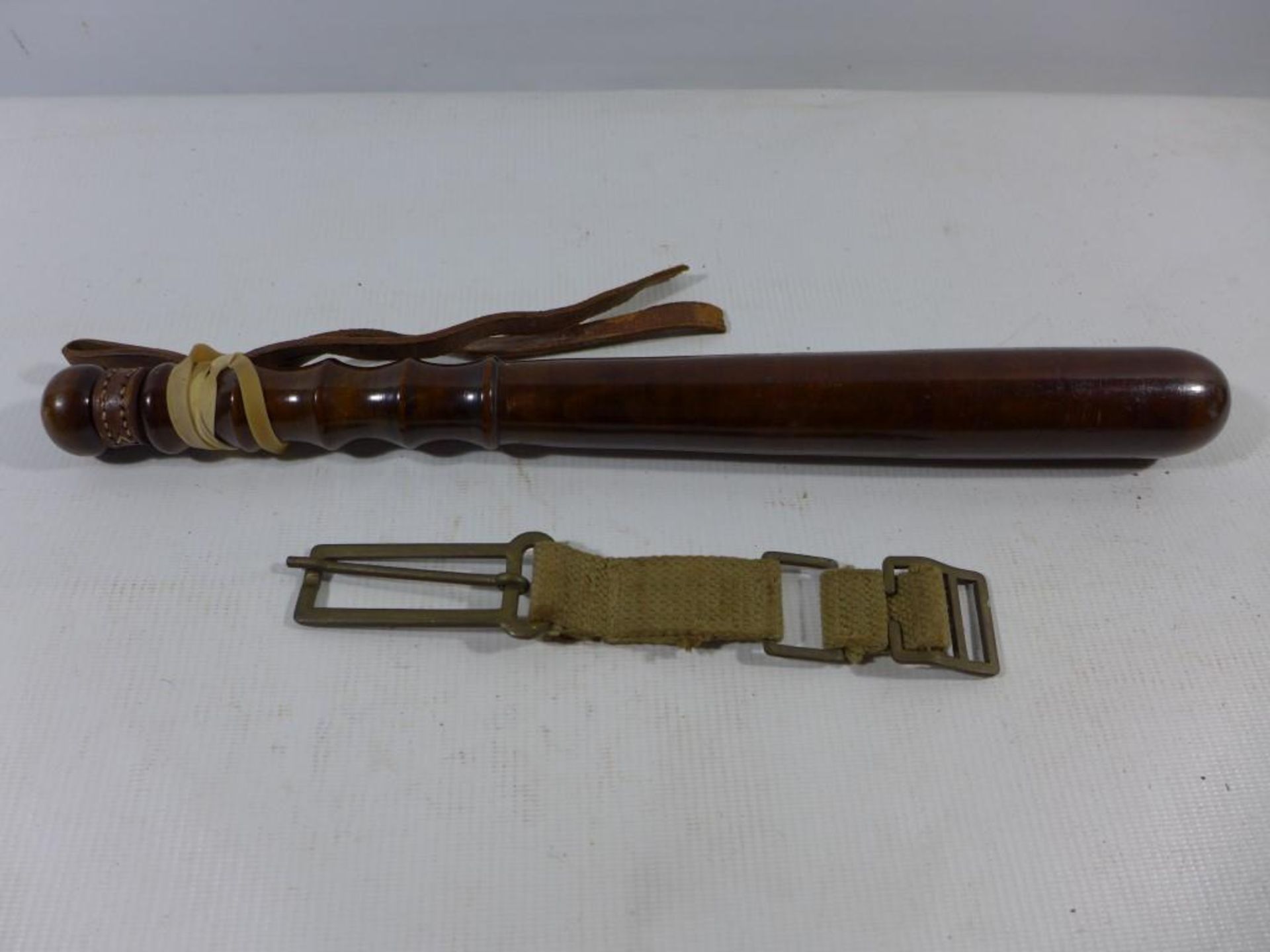 A WOODEN TRUNCHEON, LENGTH 40CM AND A CANVAS STRAP (2) - Image 2 of 2