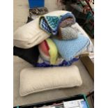AN ASSORTMENT OF PILLOWS AND CUSHIONS ETC