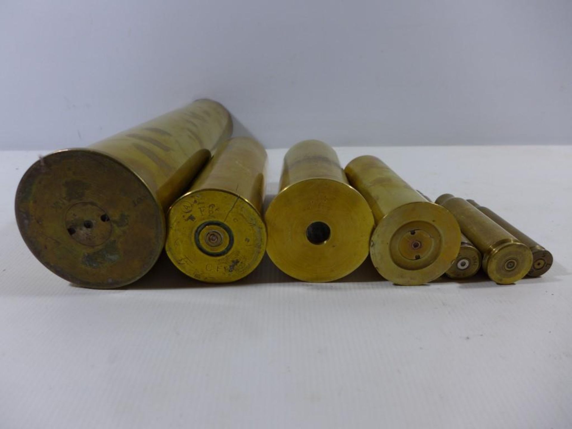 A COLLECTION OF SEVEN SHELL CASES, HEIGHTS VARY FROM 10 TO 35CM - Image 2 of 2