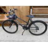 A HUFFY STALKER LADIES BIKE WITH 15 SPEED GEAR SYSTEM