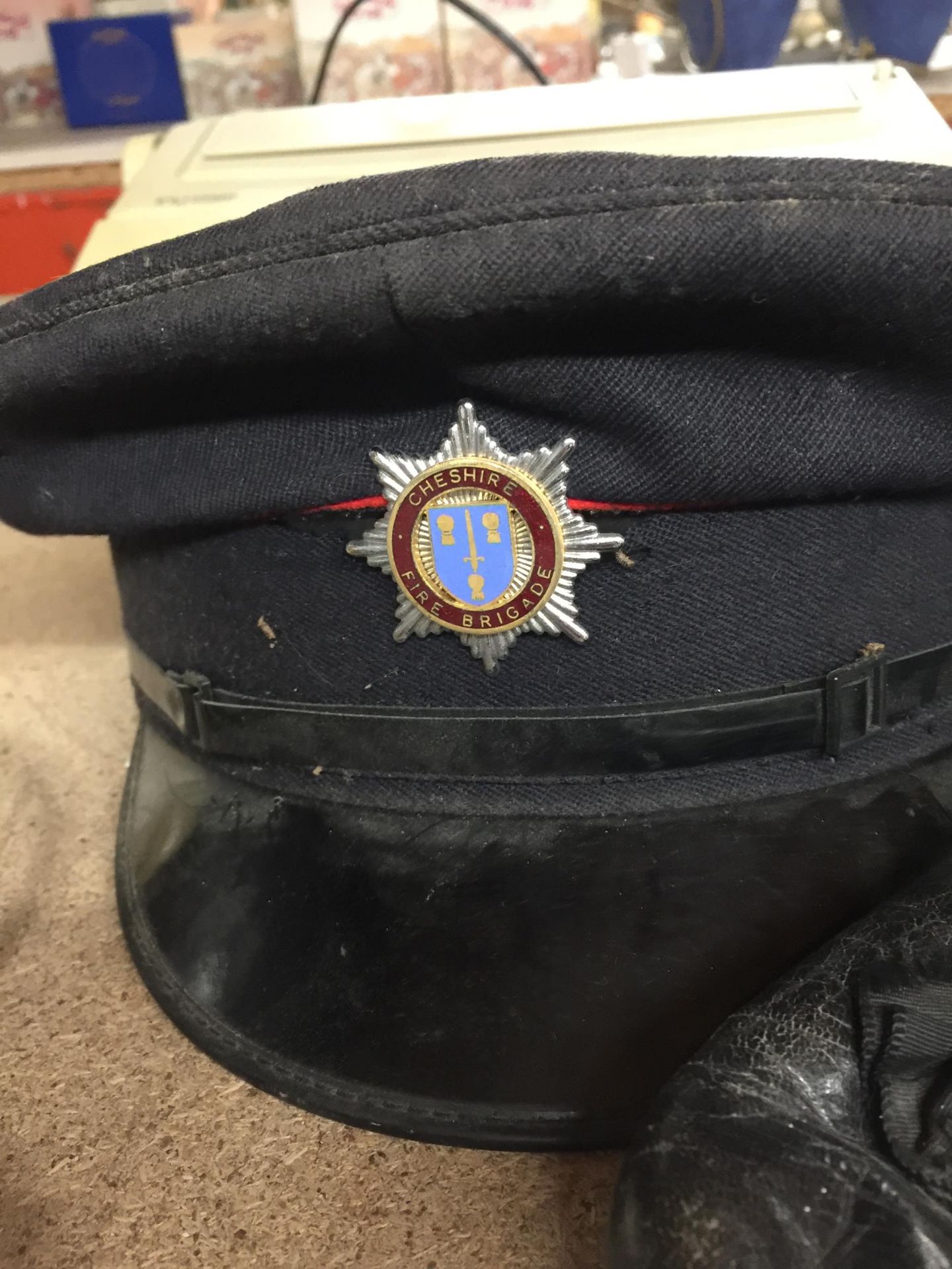 A VINTAGE CHESHIRE FIRE BRIGADE CAP WITH ORIGINAL BADGE AND A VINTAGE PAIR OF BALLET SHOES - Image 2 of 3