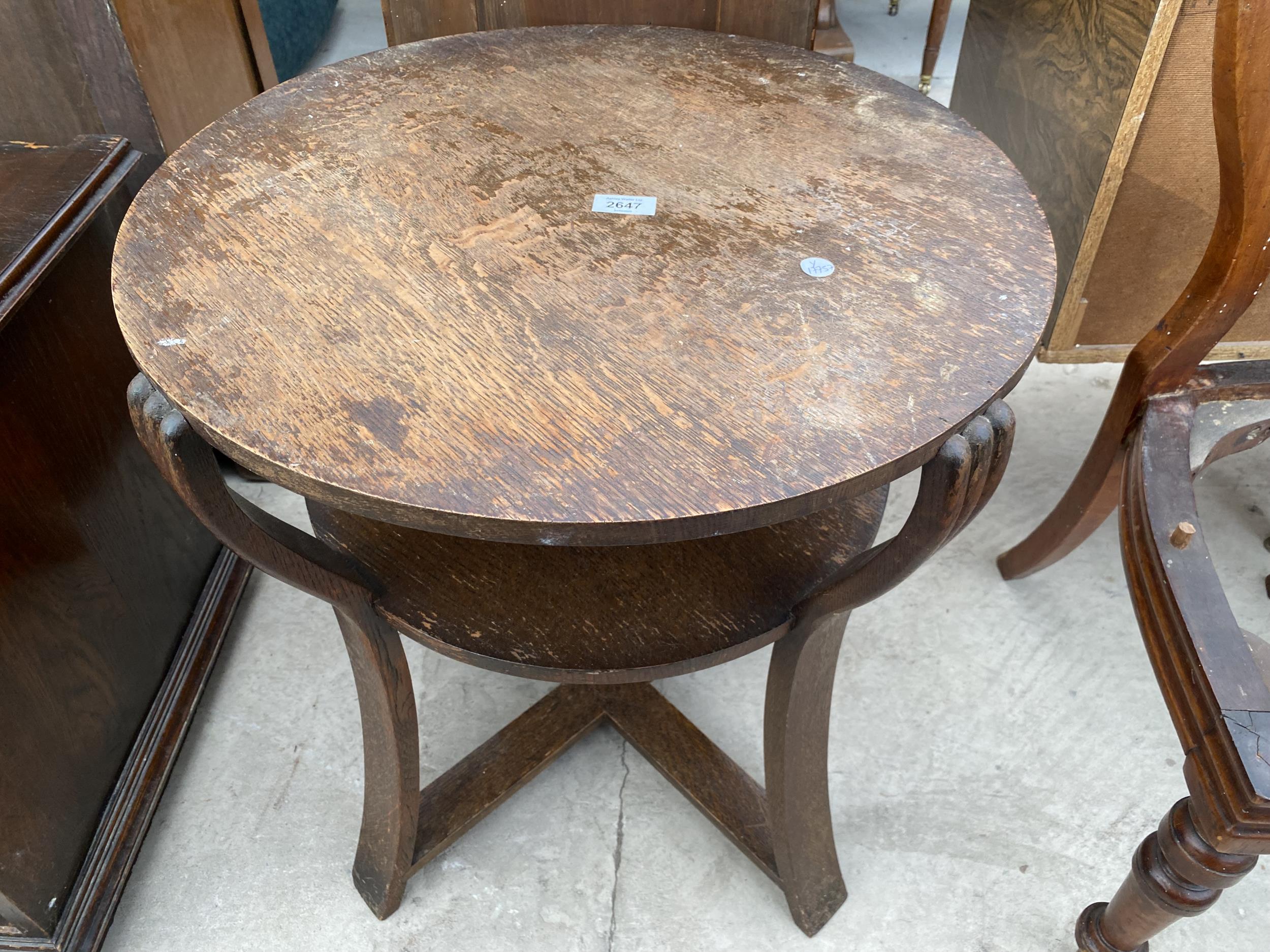 AN OAK TWO TIER ART DECO TABLE, 22" DIAMETER