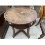 AN OAK TWO TIER ART DECO TABLE, 22" DIAMETER