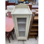 A MODERN GLASS FRONTED PAINTED CABINET WITH GALLERY BACK AND DRAWER TO THE BASE, 17" WIDE