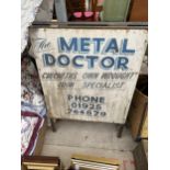 A METAL A FRAME 'THE METAL DOCTOR' SIGN