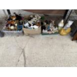 A LARGE ASSORTMENT OF CERAMIC ANIMAL FIGURES TO INCLUDE CATS AND CHICKENS ETC