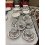 A QUANTITY OF CHINA CUPS AND SAUCERS PLUS A SUGAR BOWL