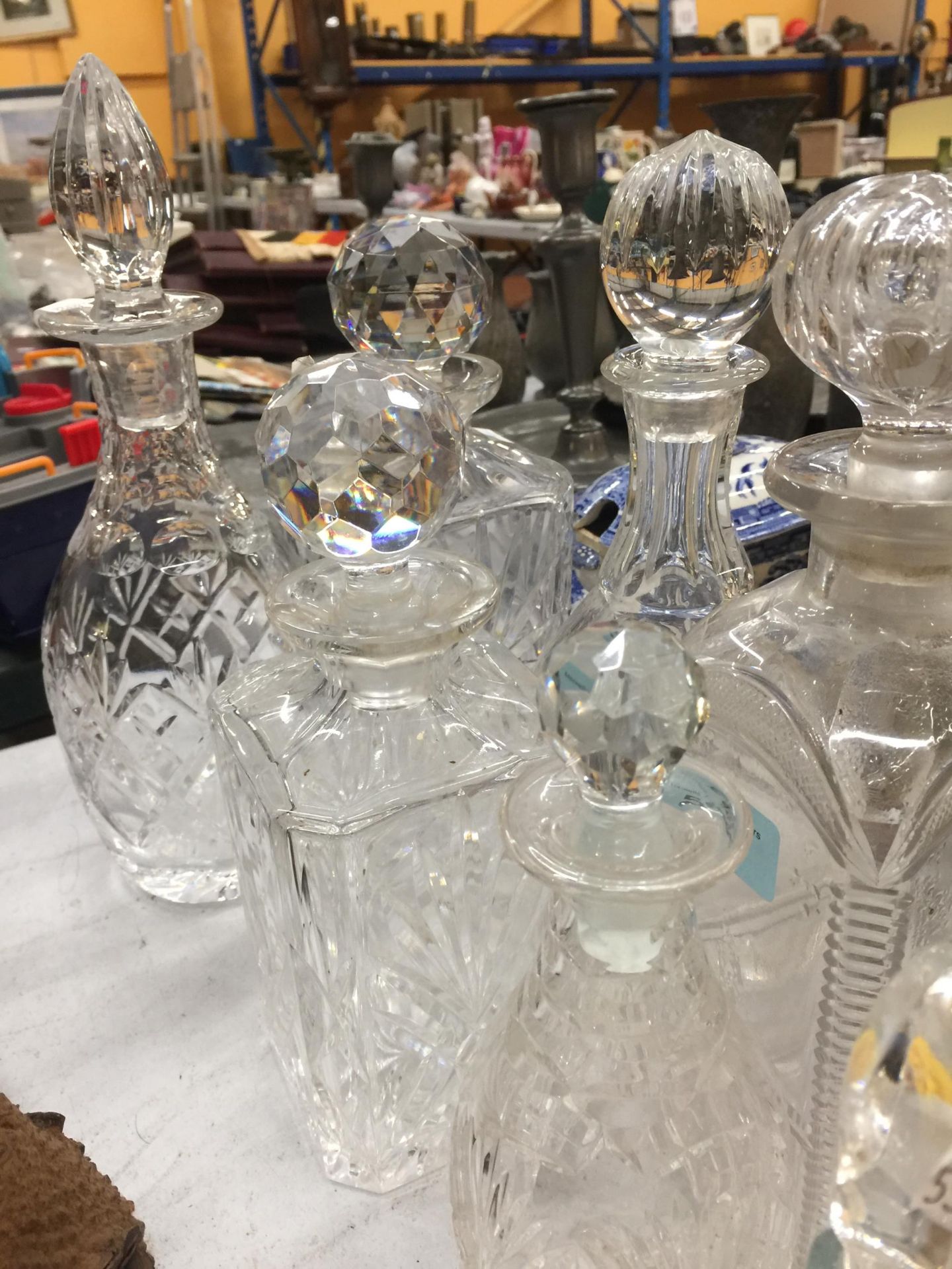 A QUANTITY OF GLASSWARE DECANTERS PLUS AN OIL BOTTLE AND TEALIGHT HOLDERS - Image 3 of 3