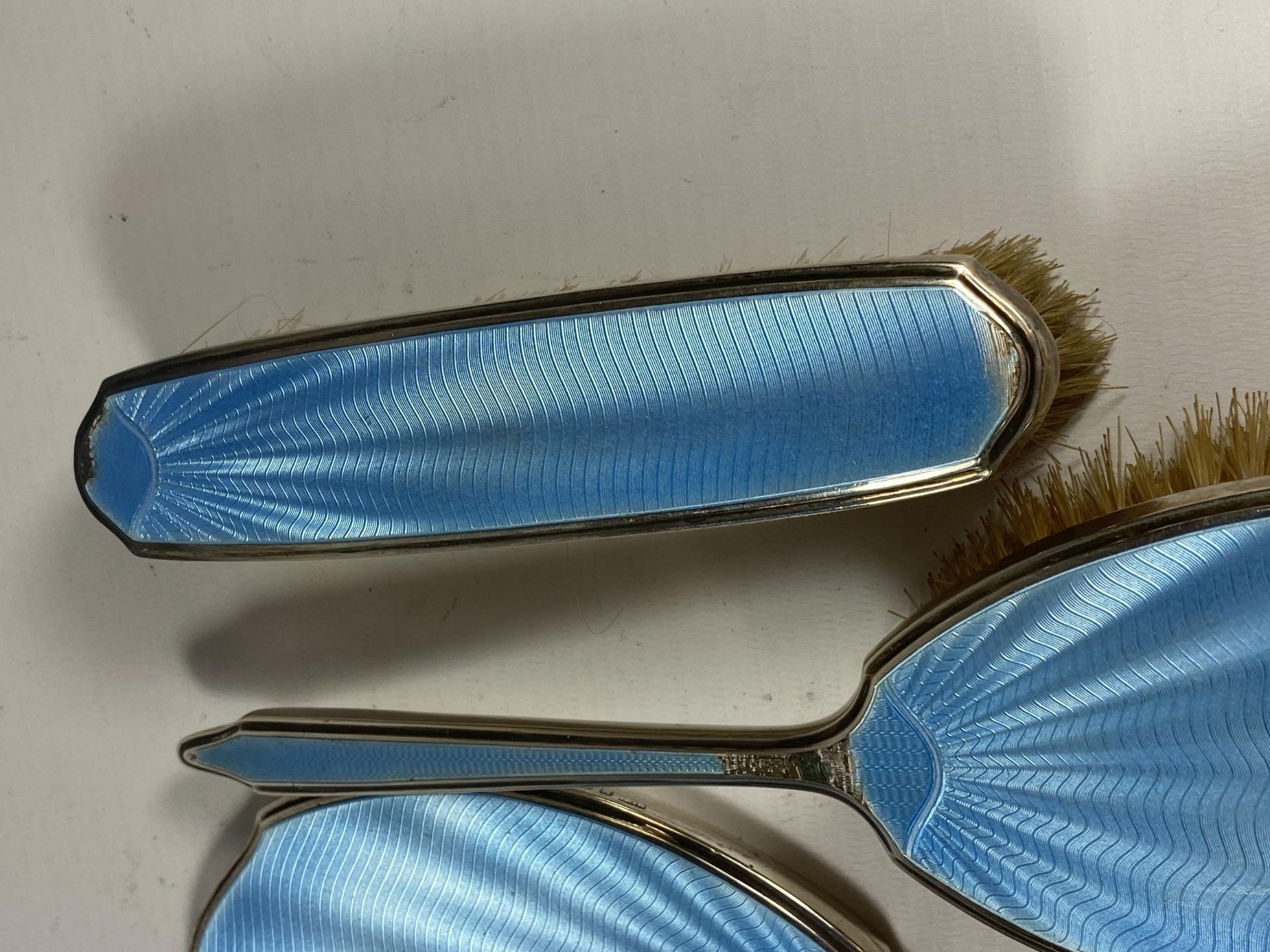 A FIVE PIECE HALLMARKED SILVER BACKED & BLUE GUILLOCHE ENAMEL DRESSING SET COMPRISING TWO HAIR - Image 5 of 9