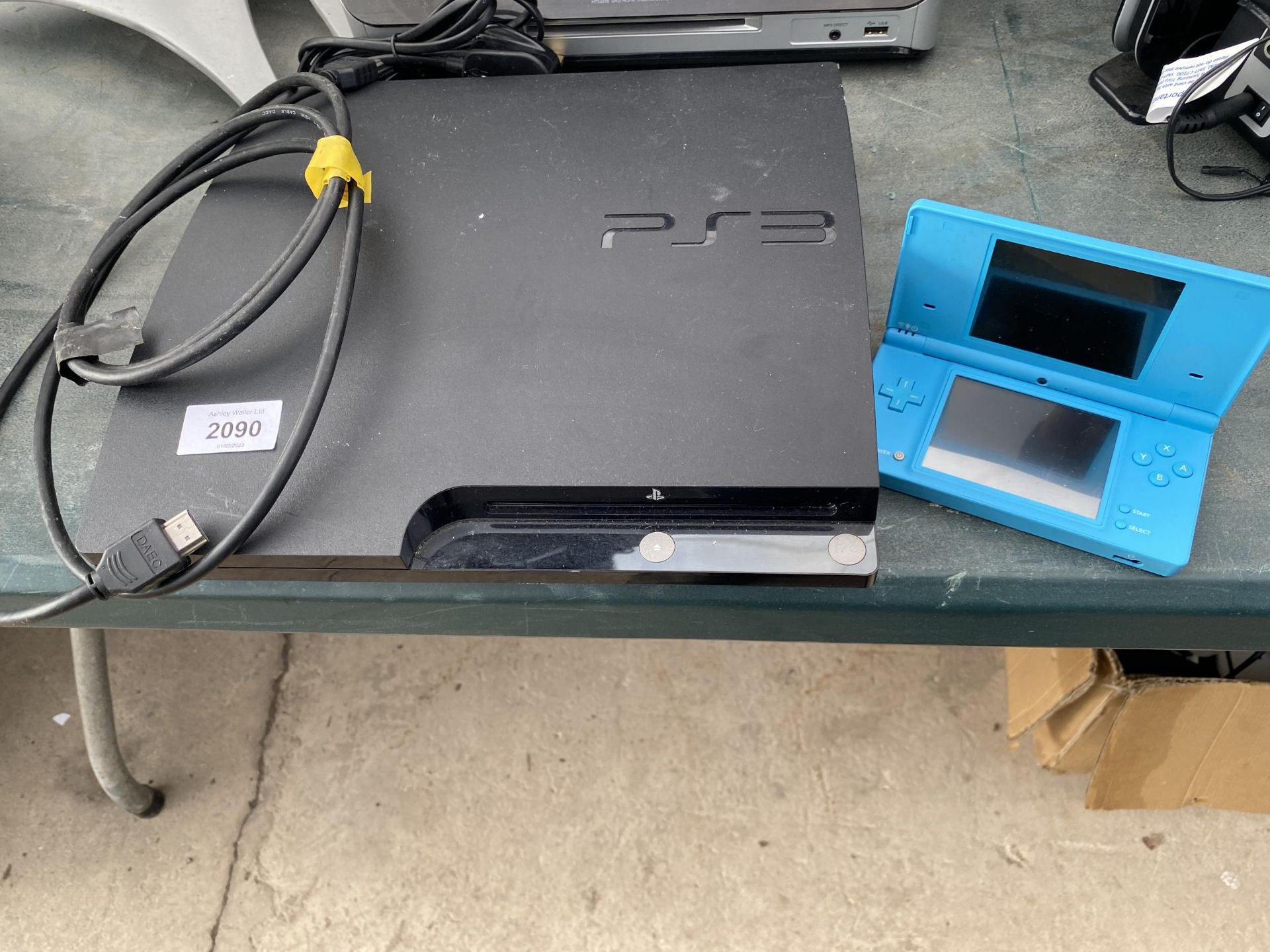 A PLAYSTATION 3 CONSOLE (NO CONTROLLERS) AND A NINTENDO DS GAME CONSOLE