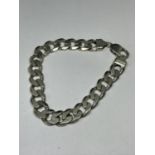 A MARKED SILVER HEAVY FLAT LINK BRACELET