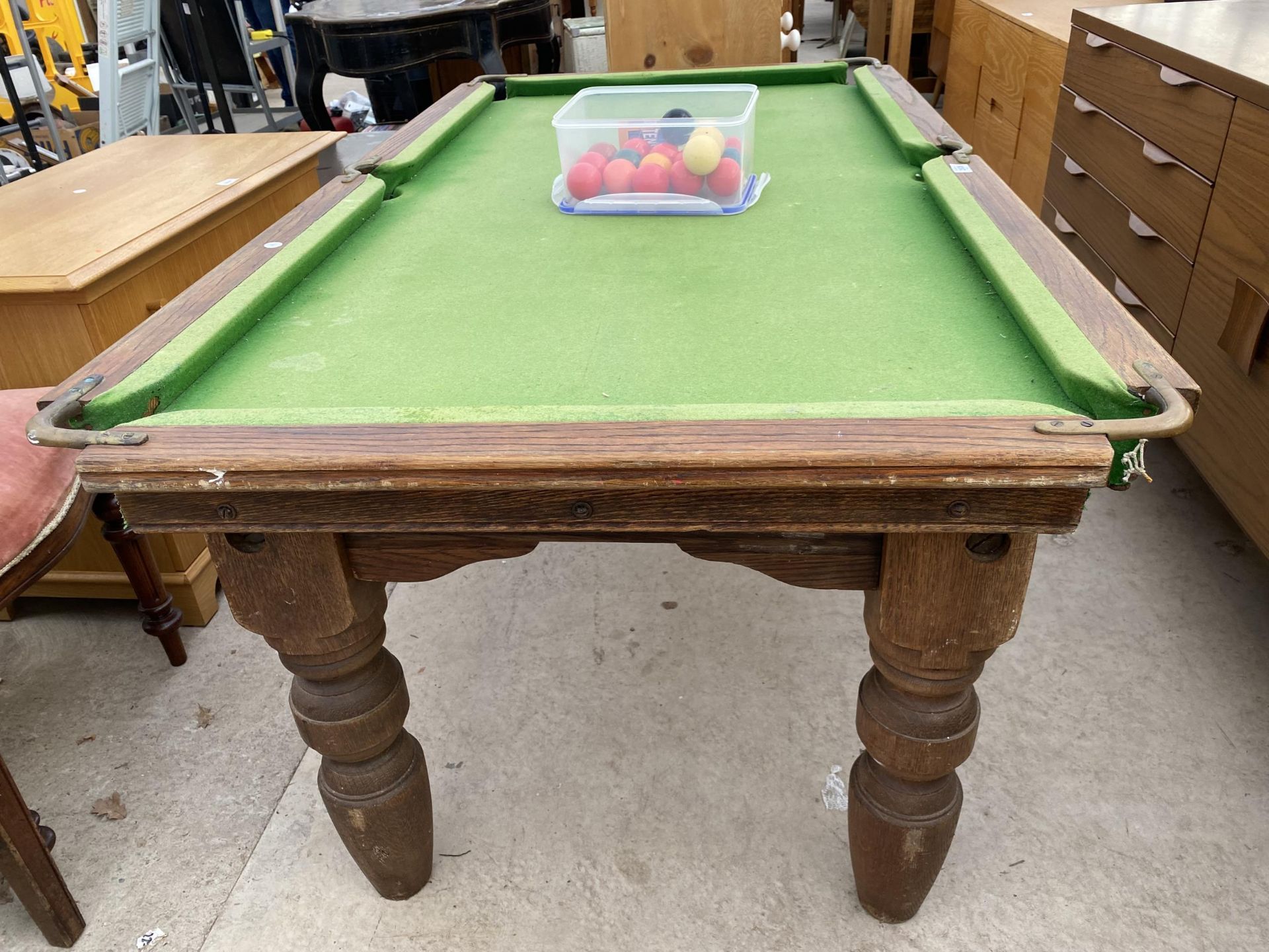 A SMALL SNOOKER TABLE (64X34") ON OAK BASE WITH TURNED LEGS, COMPLETE WITH SNOOKER BALLS AND - Image 2 of 4