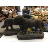 A PAIR OF VINTAGE CAST DOG DOOR STOPS