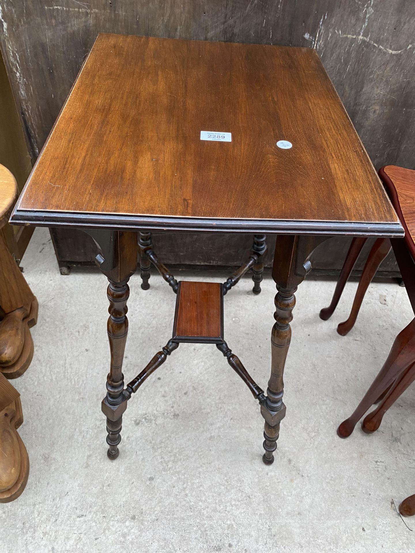 A LATE VICTORIAN MAHOGANY TWO TIER OCCASIONAL TABLE WITH TURNED LEGS AND STRETCHERS, 20X16"