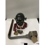 A VINTAGE 'JOLLY MAN' MONEY BANK PLUS A POSSIBLE LOCK GATE KEY