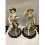 TWO LARGE CONTINENTAL STYLE FIGURINES ON WOODEN BASES HEIGHT APPROX 32CM