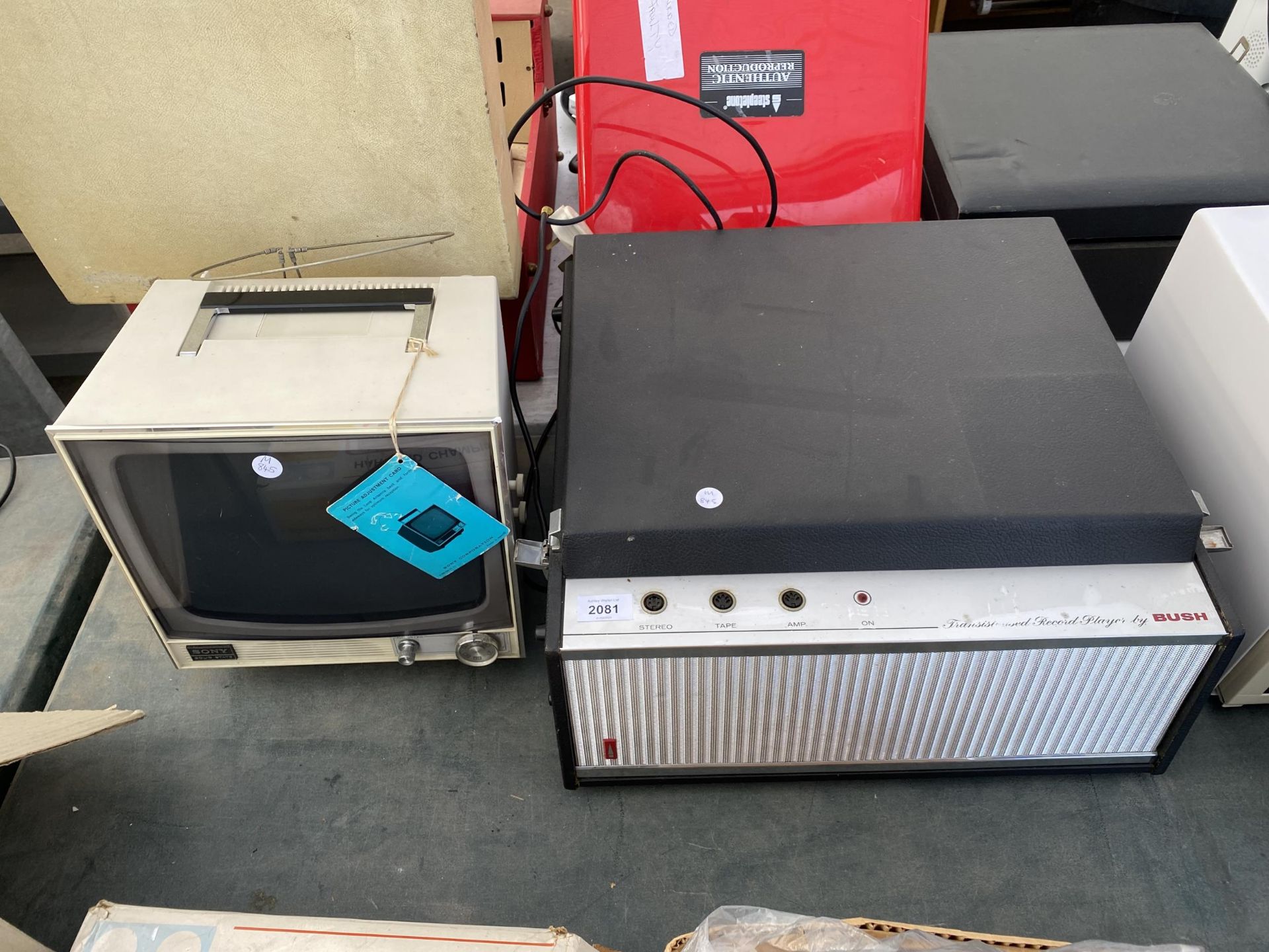 A RETRO BUSH RECORD PLAYER WITH GARRARD DECK AND A RETRO SONY TELEVISION