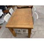 A MODERN OAK EXTENDING DINNG TABLE, 47X31" (LEAF 13") AND FOUR WHITE LATTICE BACK DINING CHAIRS