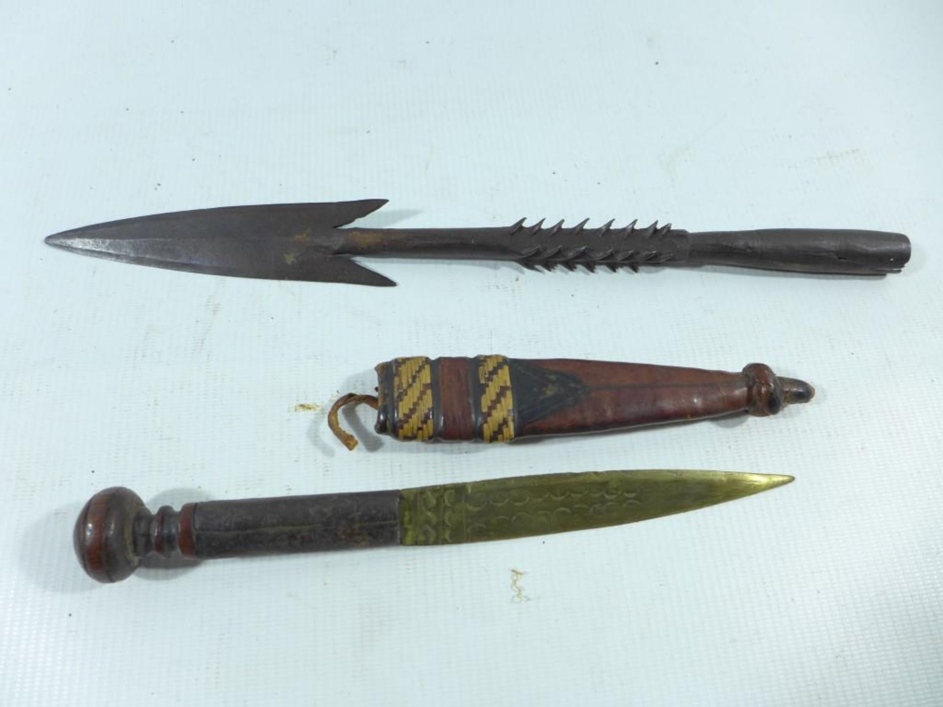 AN AFRICAN KNIFE AND SCABBARD, 14CM BLADE, 34CM SPEAR HEAD (2)