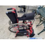 A FOLDING WHEEL CHAIR