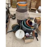 AN ASSORTMENT OF ITEMS TO INCLUDE PLASTIC PLANTERS, A WTAERING CAN AND A BIRD FEEDER ETC